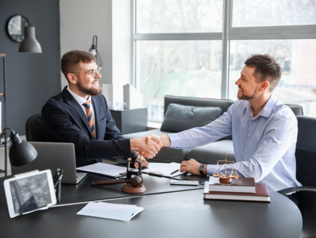 future-of-contracts-digital-signing Legal team discussing contract strategy for in-house counsel