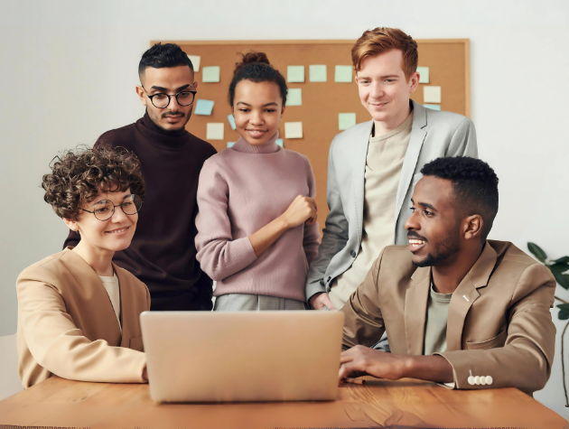 Diverse in-house legal team discussing social justice initiatives at a tech company