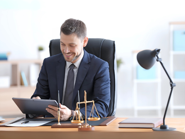 In-house lawyer using an AI legal assistant, crafting structured prompts for contract review and legal analysis
