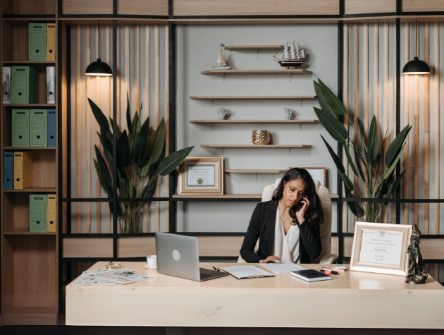 In-house generalist lawyer managing multiple legal functions in a modern office environment