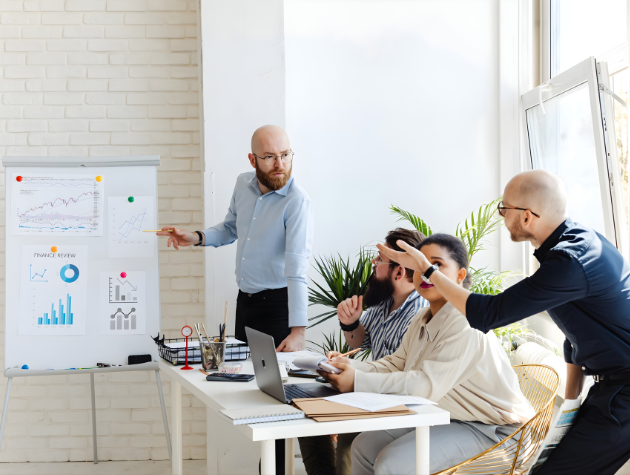 In-house legal leaders collaborating on strategy and data analysis in a modern office