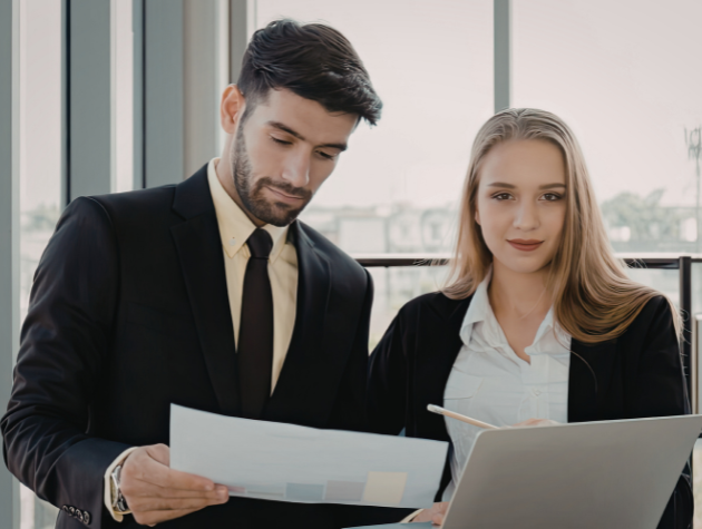 In-house lawyers reviewing documents while evaluating alternative legal services and workload strategy
