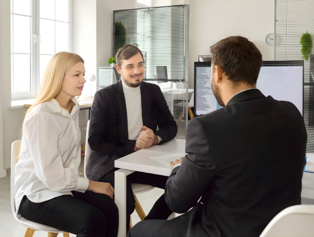 In-house legal counsel meeting with business stakeholders to discuss contracts and legal technology