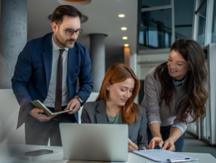 An in-house lawyer collaborating with business colleagues to develop strategic solutions.